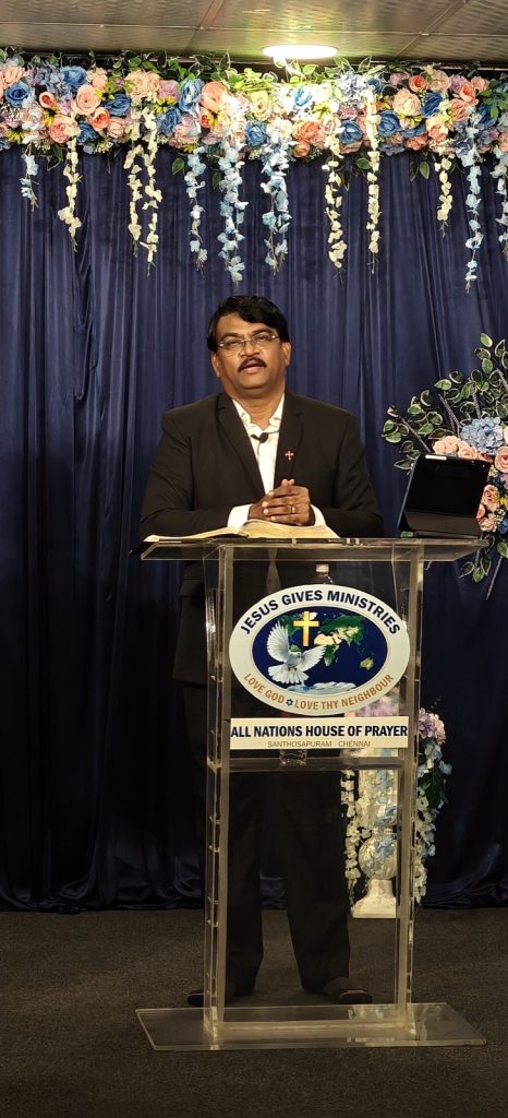 Rev. Dr. P. Arul Selvaraj at the All Nations House of Prayer pulpit