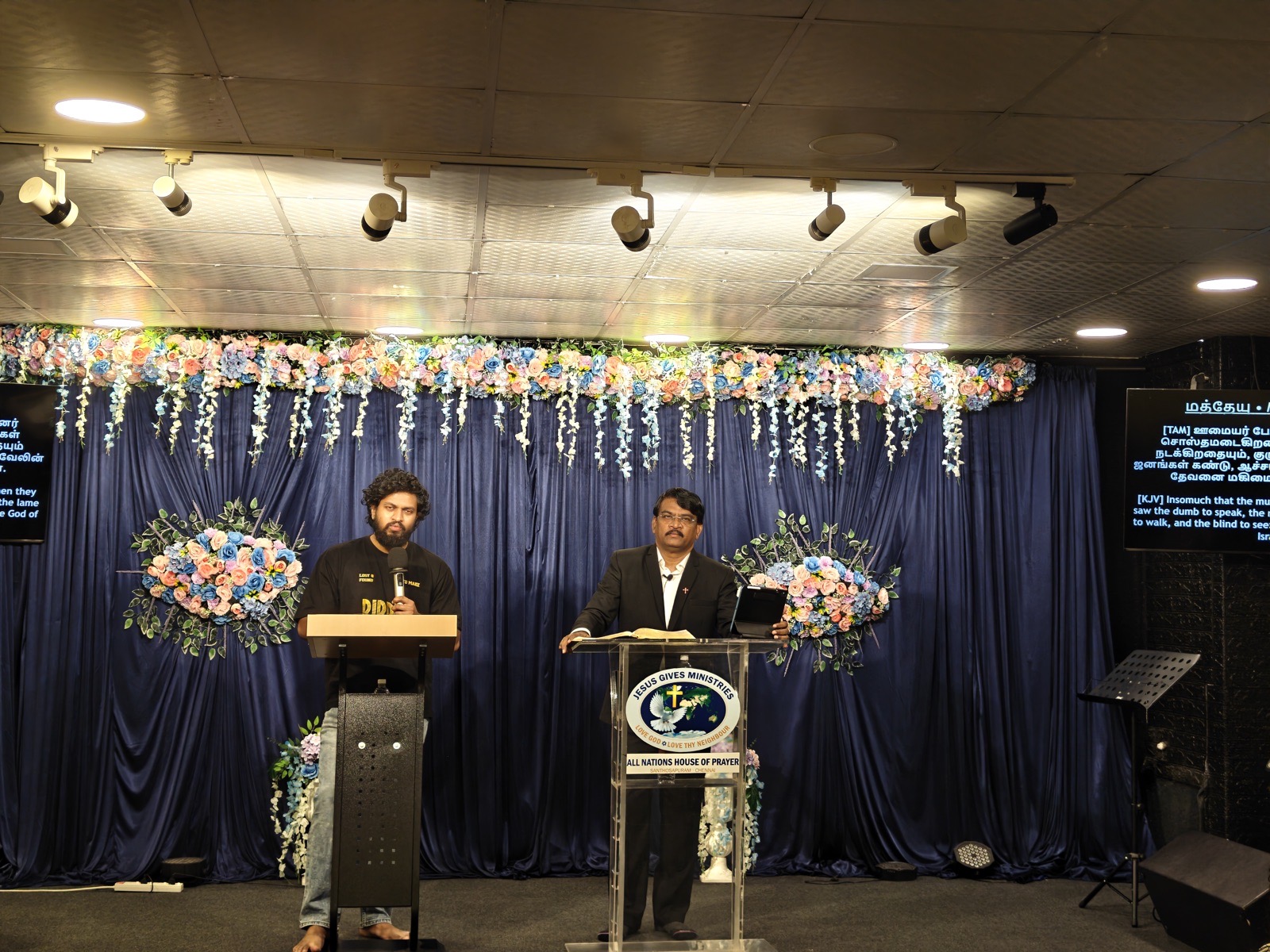Sunday worship stage at All Nations House of Prayer, Santhosapuram, Chennai, with Rev. Dr. P. Arul Selvaraj and translator