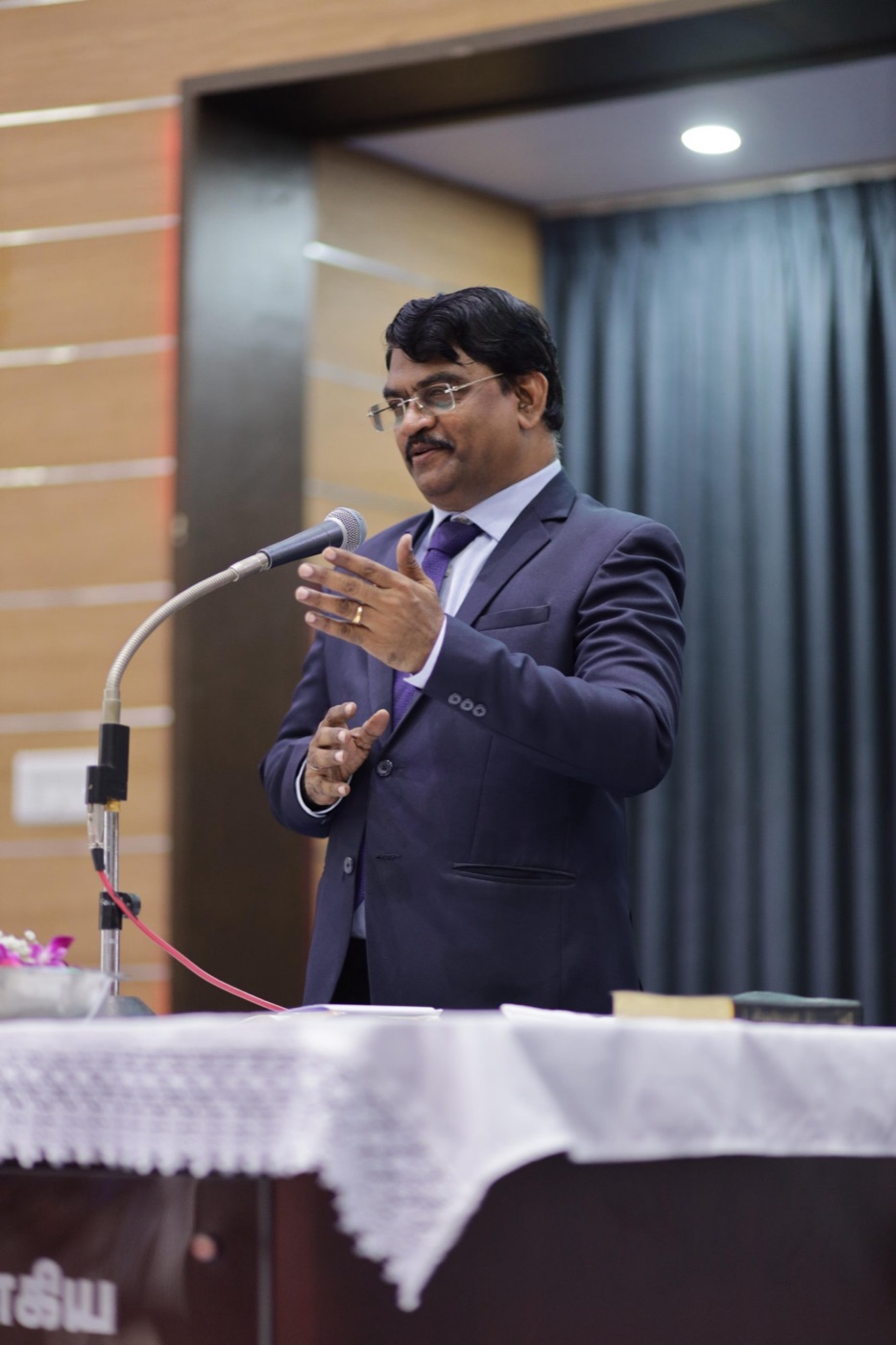 Rev. Dr. P. Arul Selvaraj teaching from the pulpit